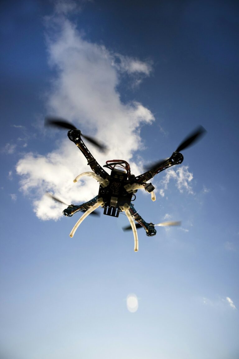 Drone in flight with cloudy sky