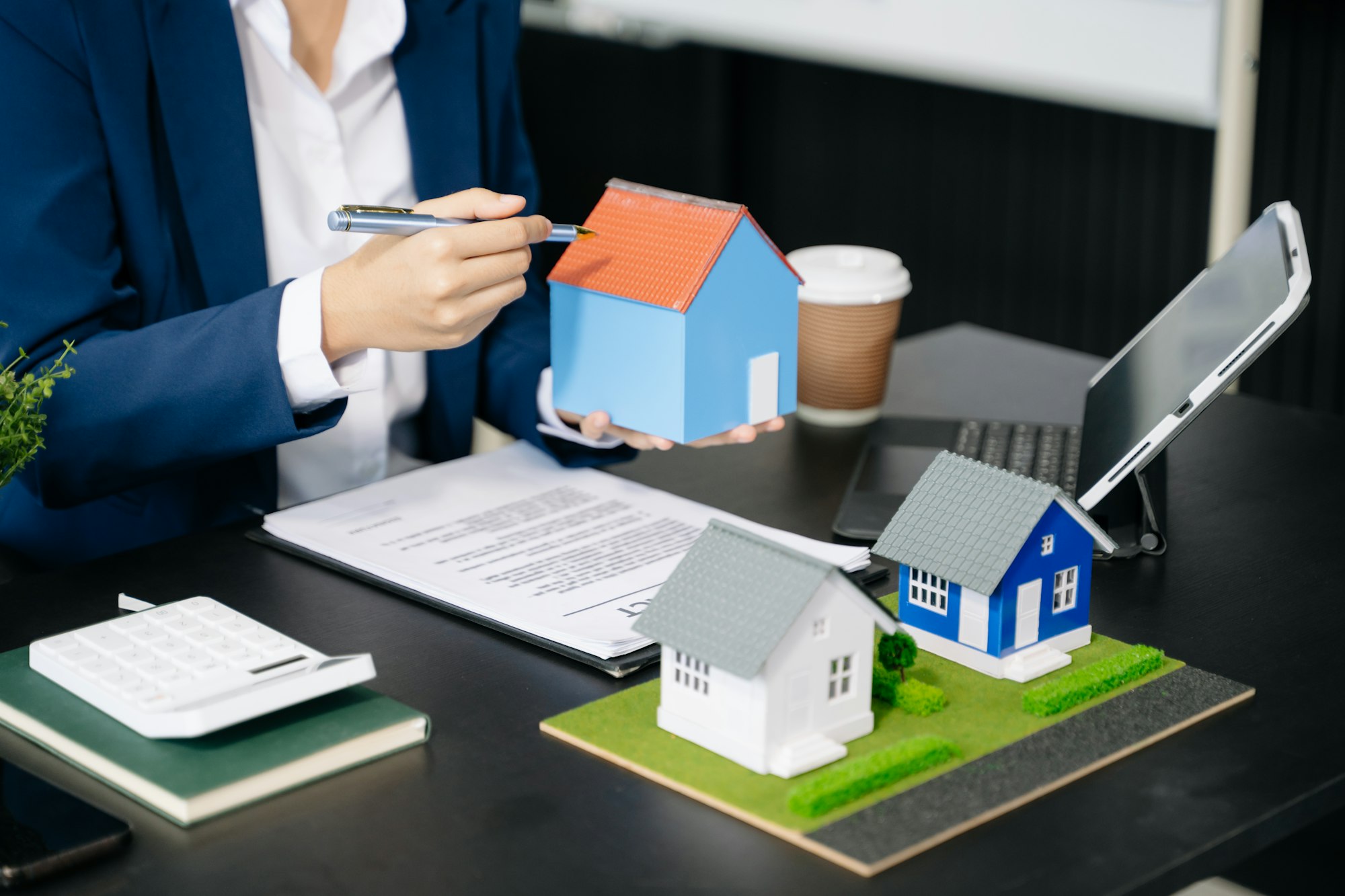 Real estate broker agent presenting and consult to customer to decision making sign insurance